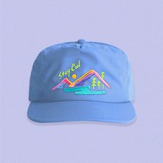 As child of the early 90s, I felt like it was high time I came up with a design that felt 90s, on an equally retro hat. As always, designed, digitized, and embroidered by me in my studio in Oregon! Each hat is made to order and made with the highest quality thread. If you're looking for a product made by the person who designed it, you've come to the right place!  Embroidered directly onto a super light and comfy nylon floppy style hat.  Hat specs: Lower profile, unstructured snapback cap Single Retro 5-panel Hat For Streetwear, Retro Trucker Hat With Embroidered Logo, Retro Blue Hat With Embroidered Logo, Blue Retro Hat With Embroidered Logo, Retro Blue Hats With Embroidered Logo, Blue Retro Trucker Hat For Streetwear, Retro Blue Hat For Streetwear, Fun 5-panel Hats For Streetwear, Retro Blue Trucker Hat For Streetwear