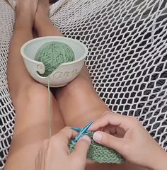 person knitting with a ceramic yarn bowl in a hammock. Ugly Yarn Bowls, Pottery Crochet Bowl, Teapot Yarn Bowl, Yarn Ceramic Bowls, Yarn Bowls Pottery Handmade, Funny Yarn Bowls Pottery, Sewing Station, Ceramic Yarn Bowl, Vogue Knitting