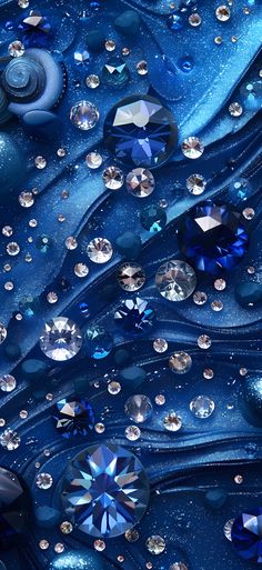 an abstract blue background with lots of diamonds and water droplets on the bottom half of it