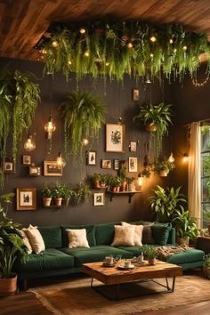 a living room filled with green couches and potted plants hanging from the ceiling