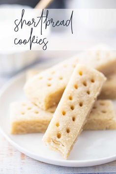 shortbread cookies on a white plate with the words shortbread cookies in front of it