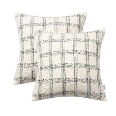 two pillows with black and white plaid pattern on the front, one is made out of linen