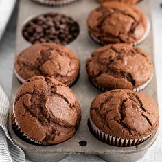 chocolate muffins in a baking pan on a table