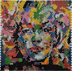 an image of the face of clown made out of beads