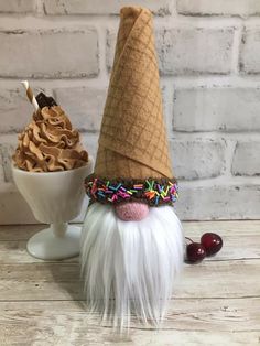 an ice cream sundae with a gnome's face on it