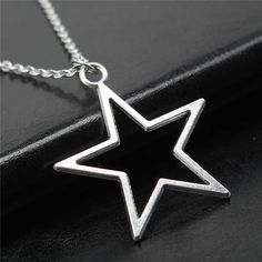 Beautifully crafted with vintage appeal, this Geometric Silver Color Hollow Star Necklace is stunningly crafted with Zinc alloy! Capture lasting style with this must-have accessory. DETAILSMaterial: MetalMetals Type: Zinc alloyStyle: VintageShape\pattern: Geometric Star Charm Necklace, Boys Jewelry, Mens Jewelry Necklace, Star Pendant Necklace, Antique Pendant, Charm Necklace Silver, Sparkle Jewelry, Star Charms, Star Pendant