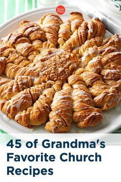 a white plate topped with croissants covered in icing