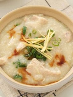 a close up of a bowl of food on a table