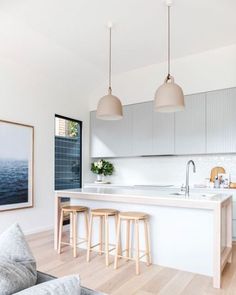 the kitchen is clean and ready to be used as a living room or dining area