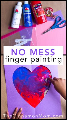 someone making a paper heart with the words no mess finger painting in front of it