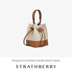 A modern take on the classic bucket bag, our best-selling osette is your perfect everyday companion. Deceptively spacious, the soft structure is handcrafted in spain from buttery-soft pebble finished leather and features an elegant drawstring closure, complete with our signature music bar. This compact yet versatile silhouette can be carried in hand by the leather top-handle, or styled as a crossbody bag with the detachable leather strap. Experience the relaxed charm of canvas, as our best-selling lana osette is re-imagined for the season. Pairing our signature grain leather with a two-tone canvas produced in italy, this relaxed style perfectly encapsulates the magic of ibiza and a summer of endless possibilities. Versatile Bucket Bag In Textured Leather, Versatile Textured Leather Bucket Bag, Chic Natural Leather Bucket Bag, Leather Bucket Bag With Detachable Strap In Natural Color, Natural Leather Bucket Bag With Detachable Strap, Cream Bucket Bag With Detachable Strap For Daily Use, Casual Beige Bucket Bag With Leather Trim, Luxury Summer Shoulder Bag For Everyday, Luxury Everyday Summer Shoulder Bag