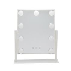 a white vanity mirror with lights on the top and below it's reflection, against a white background