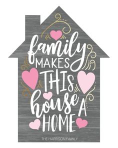 a gray house with pink hearts on it and the words family makes this house a home