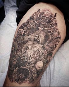 a man with a tattoo on his leg that is covered in skulls and other things