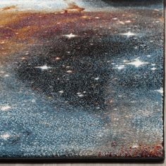 an area rug with stars on the ground