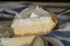 a piece of pie is being held by a fork