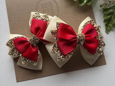 I love these bows !! Such cute ivory , gold, and red Christmas hair bows. The perfect Christmas accessories  to celebrate your little princess' Christmas or to visit Santa. My boutique hair bows are Light weight and attached to a no-slip alligator clips, perfect for girls of all ages.  Hair Bows  Measures Approx. 3.25" x 2.5" . Please reference the size before purchasing to ensure it is the size you would like. I do not accept returns.  Back to Pink hair bow boutiques store :  https://www.etsy.com/shop/PinkHairBowBoutique Christmas Hair Bows Ribbon, Gold And Red Christmas, Christmas Cheer Bows, Woman Costumes, Princess Christmas, Pigtail Hair Bows, Holiday Hair Bows, Cardboard Crafts Diy, Bows Christmas