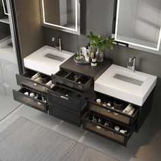 a bathroom vanity with two sinks and several drawers in front of the mirror is shown