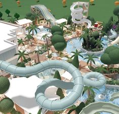 an aerial view of a water park with slides and trees