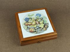 a wooden box with some fruit on it