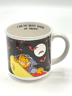 a coffee mug with the words, do my best work at night on it's side