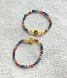 We want you to be happy : ) Handmade beads bracelet made in Seoul, Korea Fun, Shiny, clear, cheerful smile bracelet with rainbow rondelle beads and gold plated brass balls. 2 options for the number of daisies, please check option box. Great gift for all ages! Elasticated and fits most wrist sizes up to 16.5 cm. If you want to order of special length, Please contact me- /Beads Rondelle shape crystal beads of approx. 4 mm /Material Acrylic smile bead, Elastic, Gold brass ball /Dimensions Length ap Smile Beads, Smile Bracelet, Tiny Pearl Necklace, Dainty Pearl Necklace, Diy Wax, Bracelet Rainbow, Gelang Manik, Rainbow Bracelet, Rainbow Beads