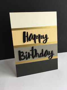 a birthday card with the words happy birthday written in black and gold letters on it