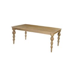 a wooden table sitting on top of a white floor