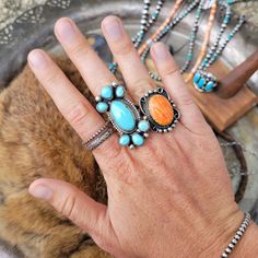 Orange Spiny Oyster set in Sterling Silver These gorgeous Spiny Oyster Rings are handmade and signed by Native American (Navajo) artist Alfred Martinez. Sizes 6.5, and 7.5 available in the drop down box. ☆ Fun Fact: Spiny Oyster is not a stone, it's an actual Oyster shell!! If you've never seen what they look like, you should google it, they're beautiful! Artisan Stackable Jewelry, Artisan Stackable Jewelry For Gifts, Unique Collectible Rings With Natural Stones, Unique Oval Stackable Jewelry, Artisan Teardrop Jewelry For Collectors, Artisan Sterling Silver Rings With Unique Variations, Artisan Rings With Unique Variations As A Gift, Unique Teardrop Collectible Jewelry, Unique Collectible Teardrop Jewelry