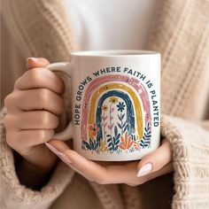 a woman holding a coffee mug with the words, hope grows where faith is planted