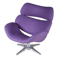 the egg chair is purple and silver