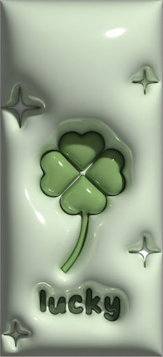 a four leaf clover with the word lucky on it