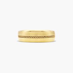 a yellow gold wedding ring with rope detailing