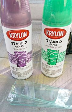 two bottles of krylon stained glass sitting next to each other