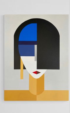 an abstract painting with blue, yellow and black shapes on the wall above it is a woman's face