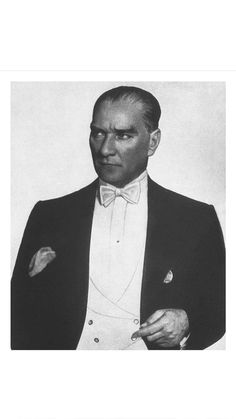 an old photo of a man in a tuxedo