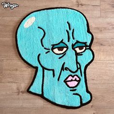 a rug with an image of a blue man's head on it