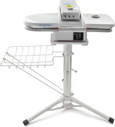 an ironing board on top of a white stand