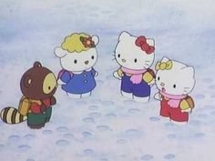 hello kitty and other cartoon characters standing in the snow