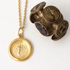 MEANING Wear this as your everyday reminder to count your blessings and give thanks for the abundant life we've been given. God gives us plenty. ABOUT THE PENDANT This pendant is handmade from an authentic wax seal stamp dating back to the 1800s. When you wear it, you are wearing a piece of art history. This wax seal pendant depicts an image of a cornucopia with the words God Gives Us wrapped around it. The word "cornucopia" is also known as the Horn of Plenty and symbolizes an abundant life. DE