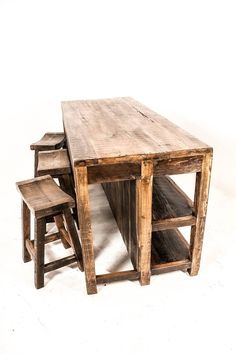 an old wooden table and two stools on a white background with the top off