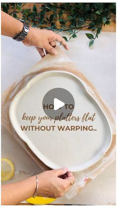 someone is wrapping up a platter on top of a table with the words, how to keep your platters flat without warping