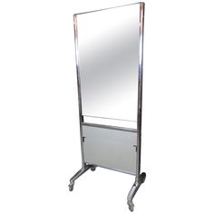 a mirror on wheels is shown against a white background