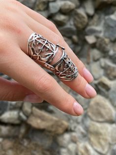 It is designed so as not to interfere with the finger movements, and you will want to wear it all day long. Armor full finger Ring shield ring sterling silver armor ring Knuckle joint ring Vintage armor ring Full finger long ring Armenian silver Worldwide tracked shipping 3-5 weeks NOTE. Please choose your exact size , as the band is wide we make it a bit larger For more Double rings chech here https://www.etsy.com/listing/862258018/double-ring-chain-ring-double-chain-ring?ref=shop_home_active_1 Armor Rings, Armor Jewelry, Finger Armor, Long Rings, Silver Armor, Full Finger Ring, Christian Cross Necklace, Pomegranate Earrings, Pomegranate Jewelry