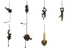 an assortment of decorative items hanging from chains