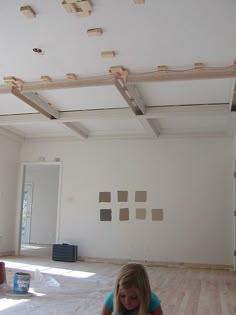 Idea for how to install faux ceiling beams. Most DIY plans show nailing an entire board to the ceiling. I like the idea of the smaller pieces being used... seems like a cost saver. Hmm? Faux Coffered Ceiling, Diy Coffered Ceiling, Tile Around Fireplace, Wood Ceilings, Coffered Ceiling, Wood Beams, Home Ceiling, The Ceiling, Ceiling Beams