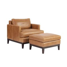 a brown chair and ottoman sitting next to each other