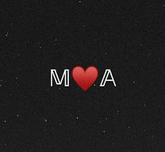 the word mom written in white letters with a red heart on it's side