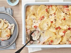 a casserole dish filled with potatoes and meat