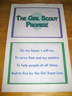 the girl scout's poem is displayed on a table